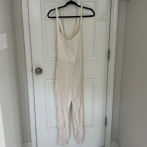 Free People Movement jumpsuit with tie back.